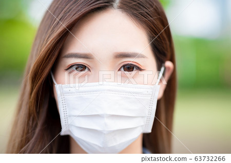 Asian woman with facial mask Asian woman with facial mask 63732266