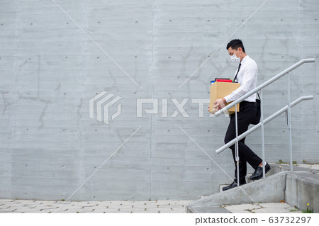 Asian man being fired 63732297