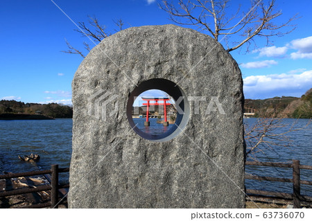Monument and torii gate of Suitengu at Lake Kameyama in Kimitsu City 63736070