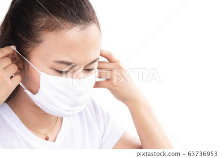 Closeup woman wearing face mask for protect air 63736953