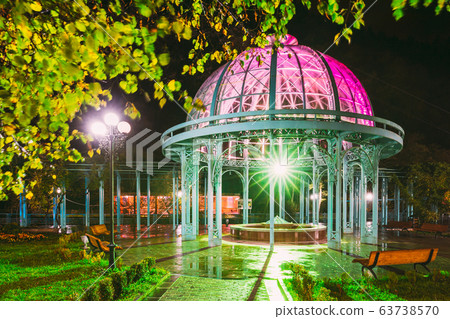 Borjomi, Samtskhe-Javakheti, Georgia. Pavilion Above Hot Spring Of Borjomi Mineral Water. Famous Local Landmark Is City Park At Autumn October Night In Illumination Lights 63738570