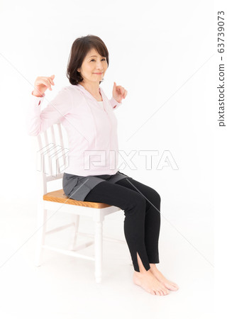 Senior woman stretching 63739073