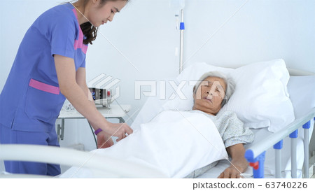 Medical concepts. The nurse is checking the 63740226