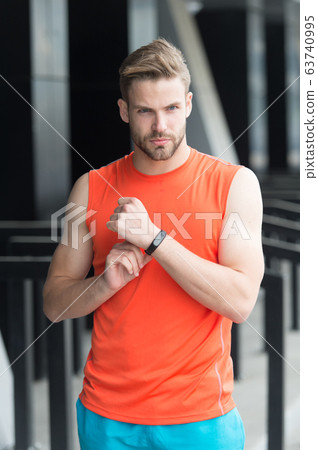 Sportsman training with pedometer gadget at Sportsman training with pedometer gadget at 63740995