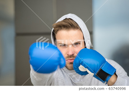 Boxing concept. Man athlete on concentrated face Boxing concept. Man athlete on concentrated face 63740996