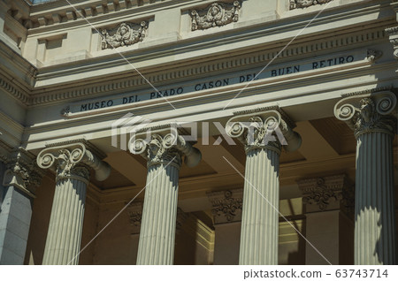 Columns with Ionic capitals on the facade of building in Madrid Columns with Ionic capitals on the facade of building in Madrid 63743714