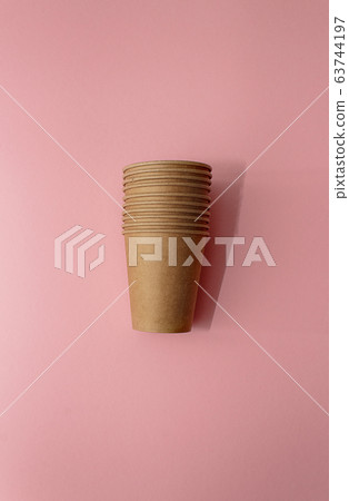 Craft paper cups for coffee or any drinks on a pink paper background. Concept of ziro waste, no plastic 63744197