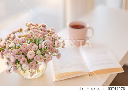 small pink flowers bouquet in glass vase with small pink flowers bouquet in glass vase with 63744678