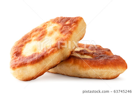 Fried pies on a white background close-up. Fried pies on a white background close-up. 63745246