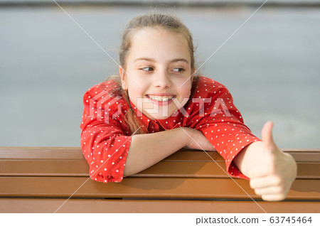Kid long hair happy smile face. Summer holidays. 63745464