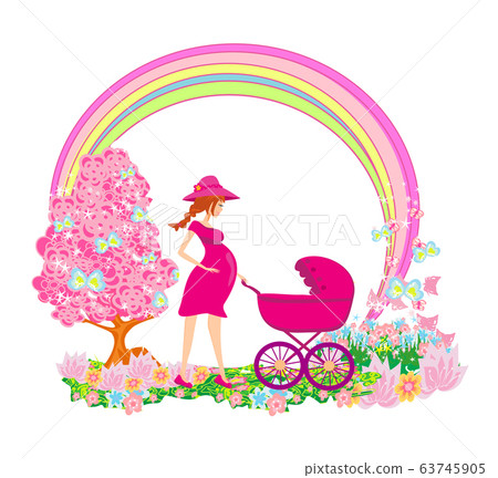 Beautiful pregnant woman pushing a stroller with 63745905