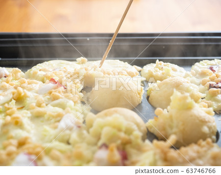 Takoyaki on hot plate Takoyaki on hot plate 63746766