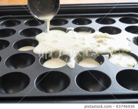 Takoyaki on hot plate Takoyaki on hot plate 63746936
