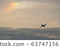 Airplane heading for rainbow colors 63747156