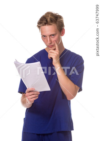 Portrait of young doctor with documents 63747999