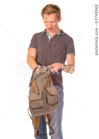 Young shocked student opening his backpack. Young shocked student opening his backpack. 63748988