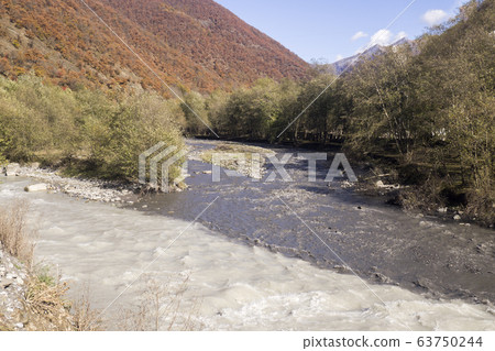 Black and white river - connection of two rivers in Georgia. Black and white river - connection of two rivers in Georgia. 63750244
