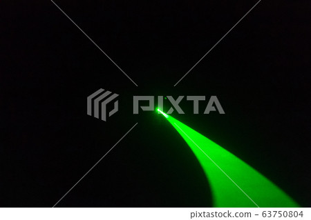 Abstract of digital green light laser line, disco light show, stage lights with laser..Green laser beams light effect on black background 63750804