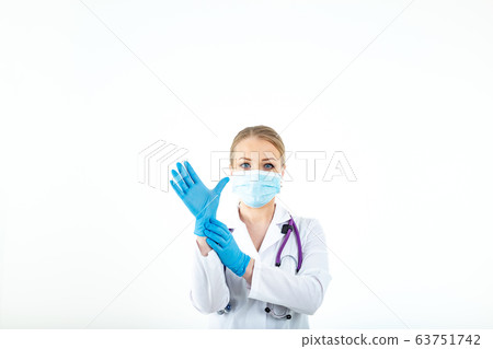 young man covering face with hand and putting other hand up front to stop camera, refusing photos or young man covering face with hand and putting other hand up front to stop camera, refusing photos or 63751742