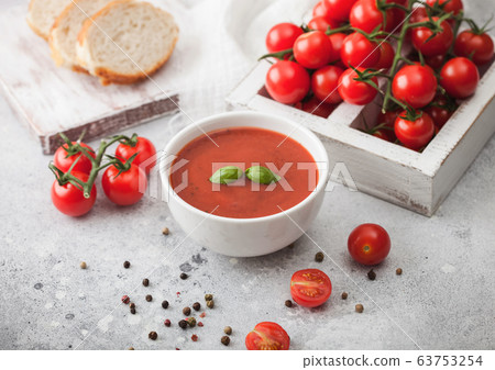 White bowl plate of creamy tomato soup with pepper White bowl plate of creamy tomato soup with pepper 63753254