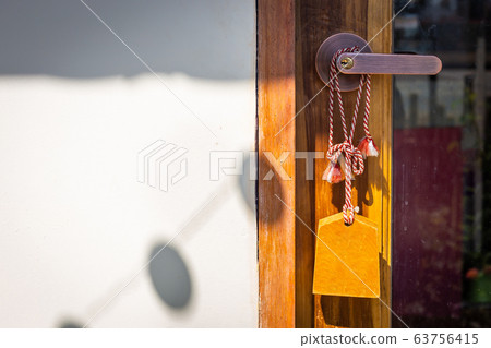 Wooden doors with glass hanging, Japanese wooden signs in front of the cafe. Copy space background Wooden doors with glass hanging, Japanese wooden signs in front of the cafe. Copy space background 63756415