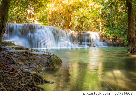 Landscape of Huai Mae Kamin waterfall Srinakarin Is a waterfall in the deep forest at Kanchanaburi, Thailand. Landscape of Huai Mae Kamin waterfall Srinakarin Is a waterfall in the deep forest at Kanchanaburi, Thailand. 63756608