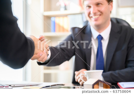 Business people shaking hands, Company partnership agreement together 63758604