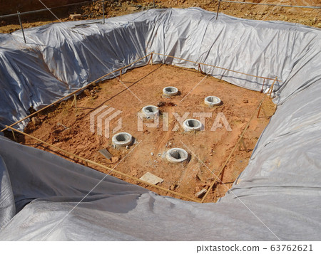 Bore pile cut to level by the construction workers. Next stage is fabricating the pile cap's reinforcement bar and formworks.   63762621