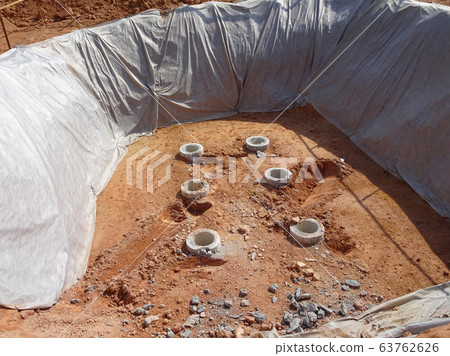 Bore pile cut to level by the construction workers. Next stage is fabricating the pile cap's reinforcement bar and formworks.   63762626