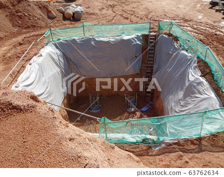 Bore pile cut to level by the construction workers. Next stage is fabricating the pile cap's reinforcement bar and formworks. Bore pile cut to level by the construction workers. Next stage is fabricating the pile cap's reinforcement bar and formworks. 63762634