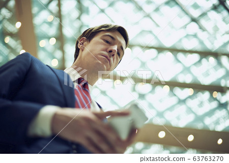 British businessman on a business trip in Tokyo British businessman on a business trip in Tokyo 63763270