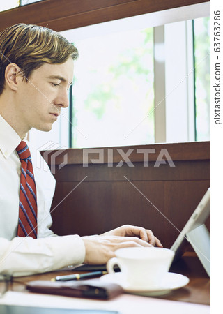 British businessman on a business trip in Tokyo British businessman on a business trip in Tokyo 63763286