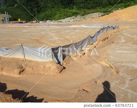 Erosion at ground and slopes is caused by rainfall. The soil structure is weak and there are landslide. Safety measure has been taken in some area. 63763721