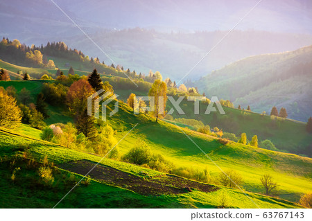 countryside scenery in mountains at sunset. countryside scenery in mountains at sunset. 63767143