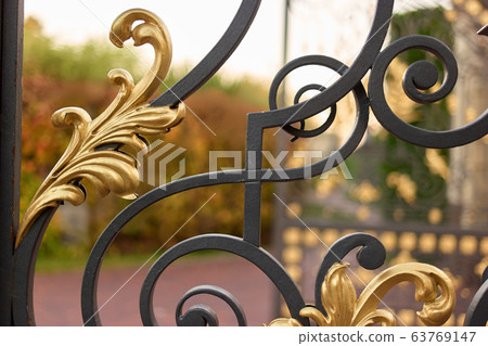 Metal abstract park gates ornament. Metal abstract park gates ornament. 63769147