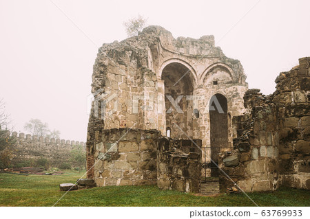 Ninotsminda Village, Kakheti Region, Georgia. Ruins Of Old Church Monastery Of Saint Nino, Ninotsminda Near Sagarejo. Monastery Was One Of Most Important Spiritual And Educational Centers In Georgia. Ninotsminda Village, Kakheti Region, Georgia. Ruins Of Old Church Monastery Of Saint Nino, Ninotsminda Near Sagarejo. Monastery Was One Of Most Important Spiritual And Educational Centers In Georgia. 63769933