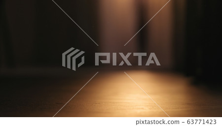 low angle shot of interior with sunset light and some dust floating in air 63771423