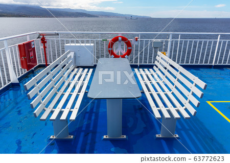 deck with benches on a ship deck with benches on a ship 63772623