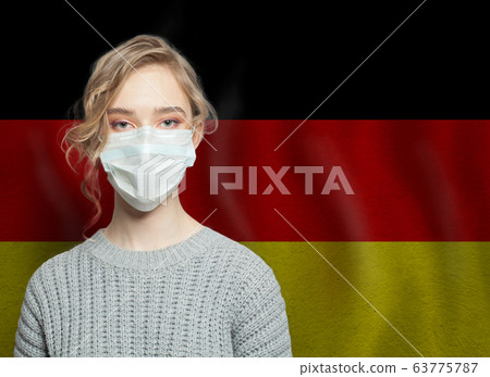 German woman wearing a face mask with flag German woman wearing a face mask with flag 63775787