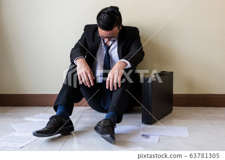 Sad unemploy businessman due to corona virus 63781305