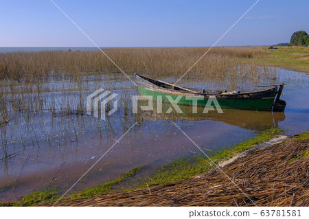 Colorful wooden fishing boat, Lagoa Dos Patos near the Lagoa Do Peixe National Park, Rio Grande do Sul, Brazil Colorful wooden fishing boat, Lagoa Dos Patos near the Lagoa Do Peixe National Park, Rio Grande do Sul, Brazil 63781581