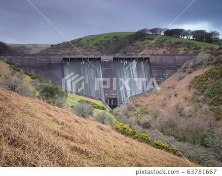 Water spilling over Meldon Dam on the West Okement River, Meldon Reservoir, Dartmoor National Park, Devon Water spilling over Meldon Dam on the West Okement River, Meldon Reservoir, Dartmoor National Park, Devon 63781667