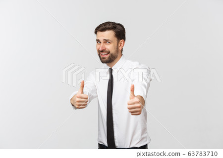 Happy smiling young business man with thumbs up gesture, isolated over white background Happy smiling young business man with thumbs up gesture, isolated over white background 63783710