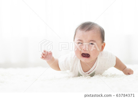 Gann crying 7 month old girl 63784371