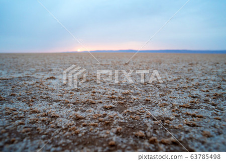 Salty Desert in Tunisia at dawn sunrise Salty Desert in Tunisia at dawn sunrise 63785498