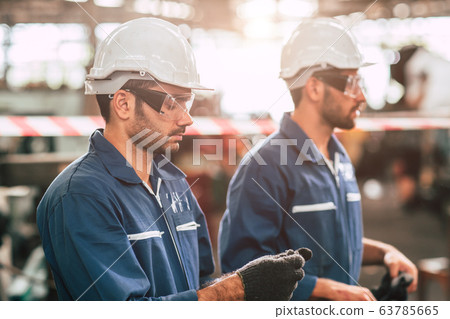 Head of engineer, worker leader portrait self confidence and professional look Head of engineer, worker leader portrait self confidence and professional look 63785665