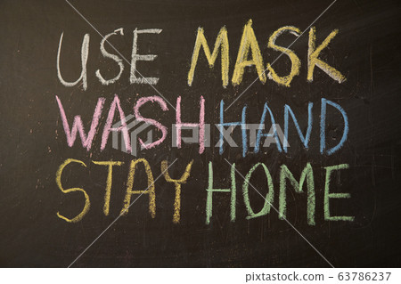 Outbreak Warning. written white chalk on 63786237