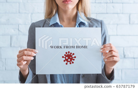 Inscription work from home in hands of girl Inscription work from home in hands of girl 63787179