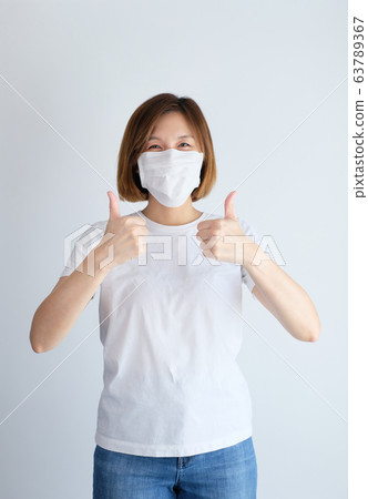 woman wearing mask get sick from corona virus, 63789367