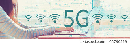 5G network with woman working on a laptop 5G network with woman working on a laptop 63790319